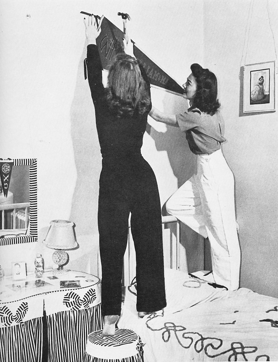 In 1942, two @williamandmary students decorated their new dorm room with a cool W&amp;M pennant. This year’s #wmMoveIn starts early tomorrow morning! What do you recommend new students bring for their dorm rooms this year? #ThrowbackThursday #tbt